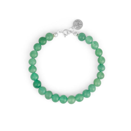This bracelet glows with soft green Aventurine pearls, like drops of morning dew on lily pads. by Carolinne B