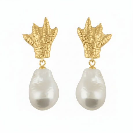 Handcrafted gold lizard earrings with pearl, showing intricate sculptural details and refined craftsmanship.