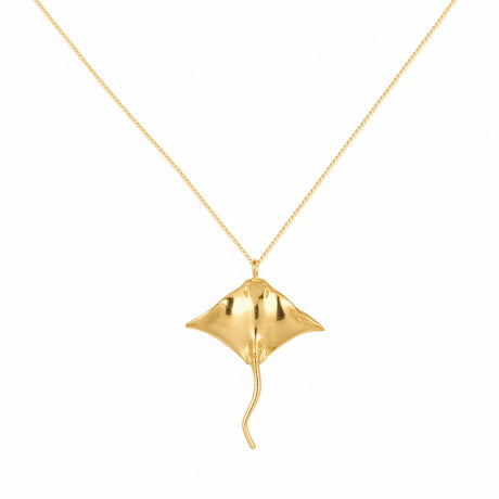 Gold stingray pendant on a chain from carolinne B jewelry