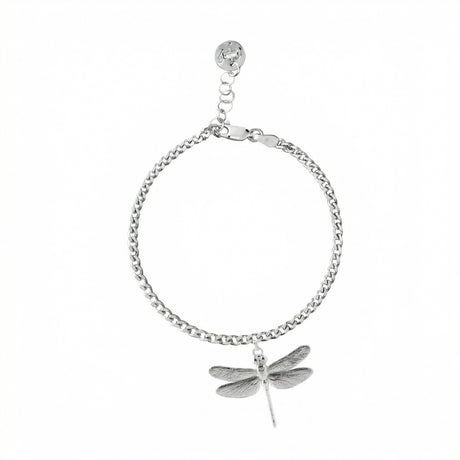 Silver bracelet with a dragonfly charm on a white background
