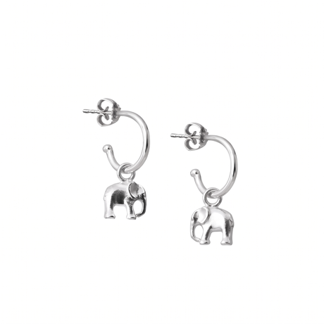 A pair of silver huggie hoop earrings with dangling elephant charms, shown on a plain white background.