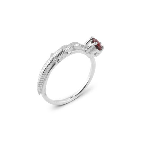 Silver ring with a red gemstone, a garnet. Fierce and bold statement minimal piece