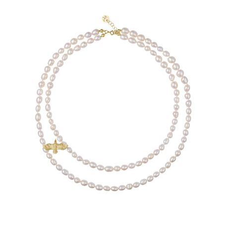 A double strand pearl necklace with a gold-plated raven pendant on a white background.