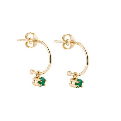A pair of 18k gold-plated silver hoop earrings with emerald gemstones attached to the hoops.