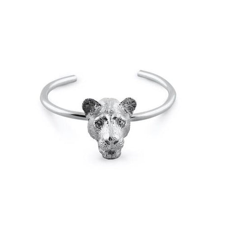 Sculptural lioness bangle in silver, capturing strength, elegance, and wild beauty in a bold statement piece