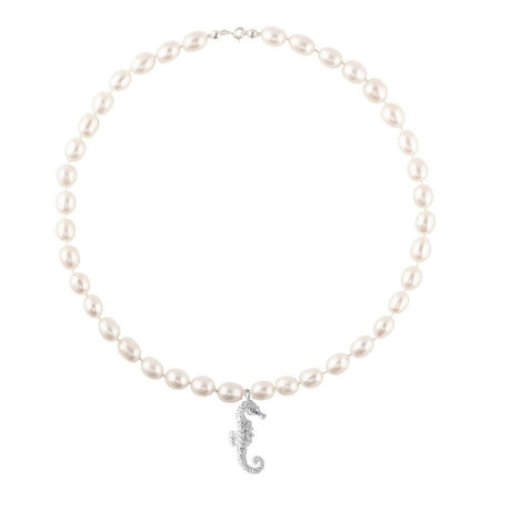 A necklace with lustrous freshwater pearls and a silver seahorse pendant.