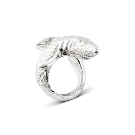 A solid silver ring with a realistic shark design wrapped around the finger, featuring polished accents.