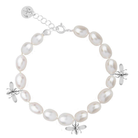 A bracelet with silver beads and freshwater pearls featuring three silver bee charms.
